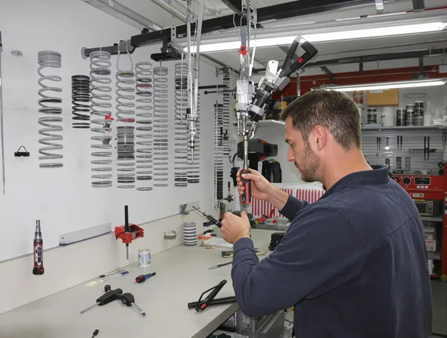 Gastonia Garage Door Repair safety certified technician performing precision spring replacement in Gastonia
