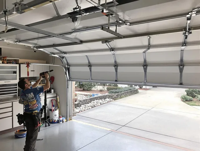 Garage door track repair service by Gastonia Garage Door Repair in Gastonia